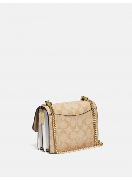 Coach - купить оригинальные аксессуары бренда в Москве